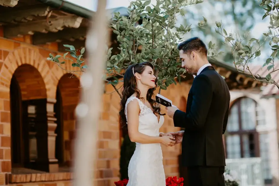 Aaron and Amanda close together in the courtyard, Riverside