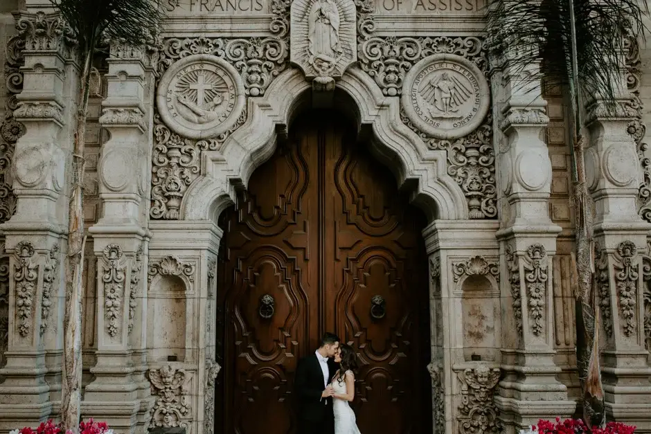 Aaron and Amanda framed by the carved stone doorway, Riverside