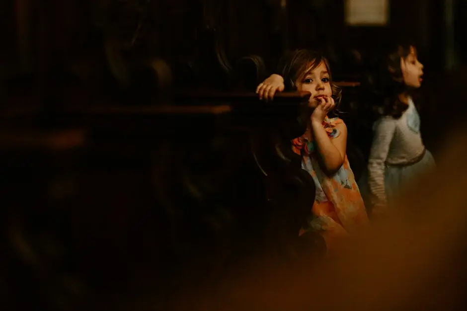 Two children watching from the balcony rail, Riverside