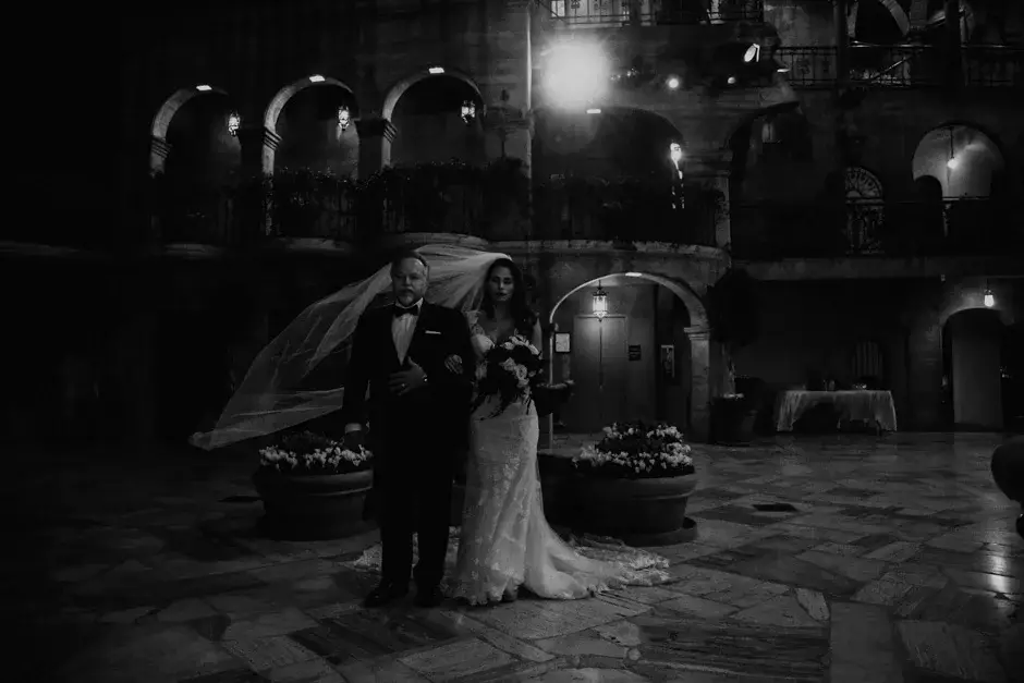 Aaron and Amanda in the courtyard at night, black and white