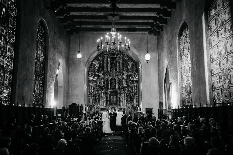 The chapel and its gold reredos seen wide, black and white