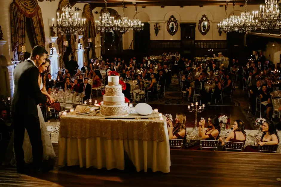 Aaron and Amanda at the tiered cake in the ballroom, Riverside