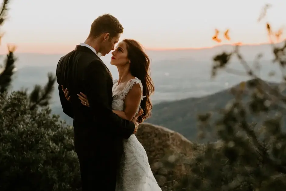 The two of them holding each other above the valley, California
