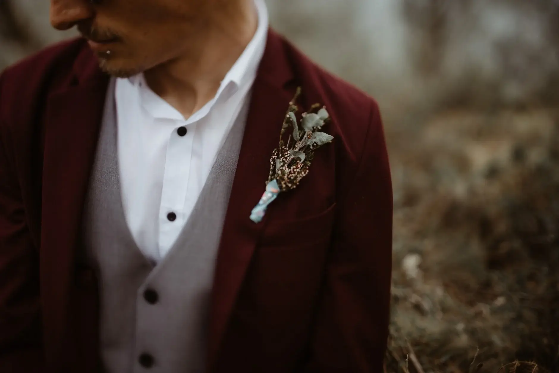 Drew’s burgundy suit and native buttonhole, New England National Park