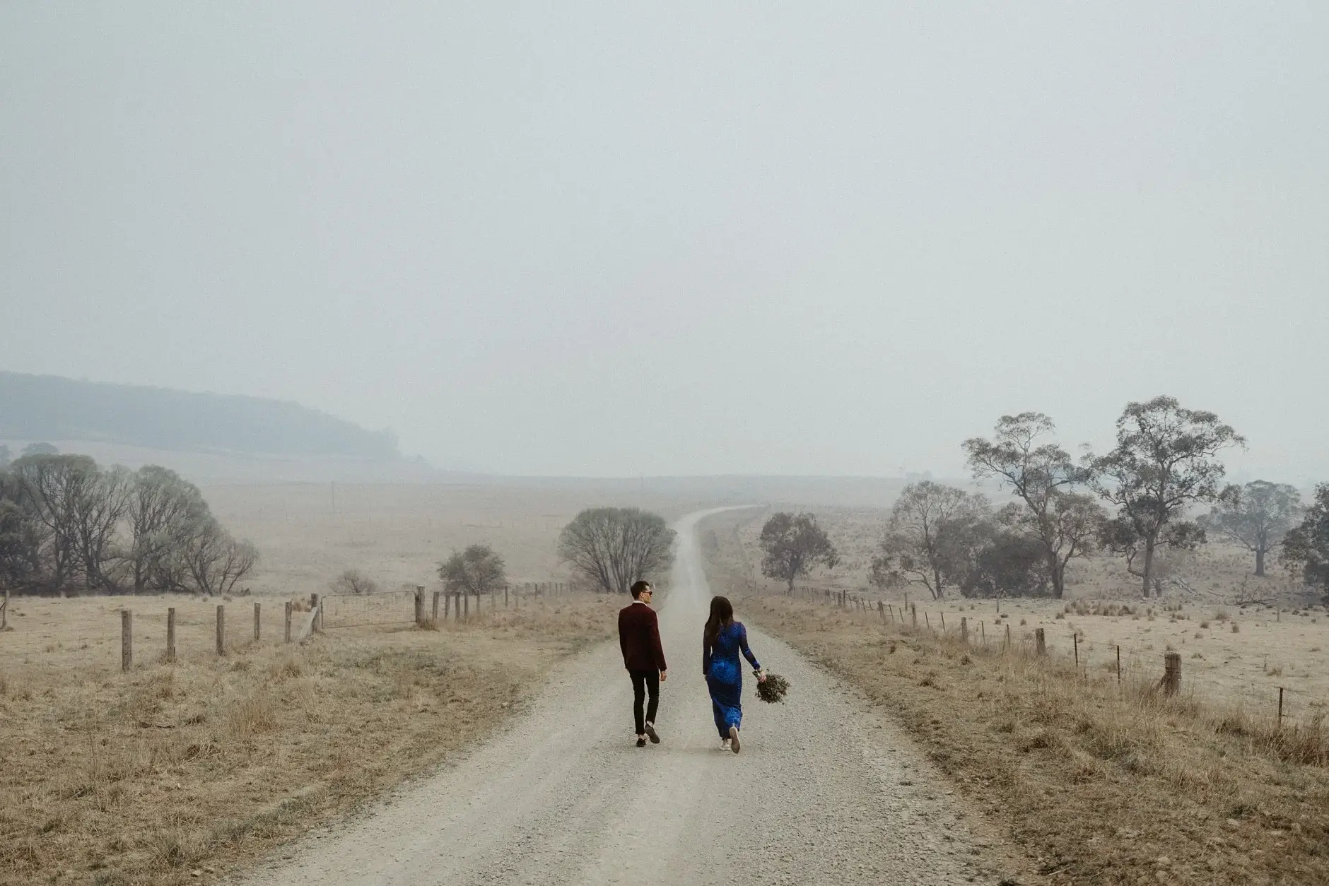 Jess and Drew far down the smoke-filled road, New England National Park