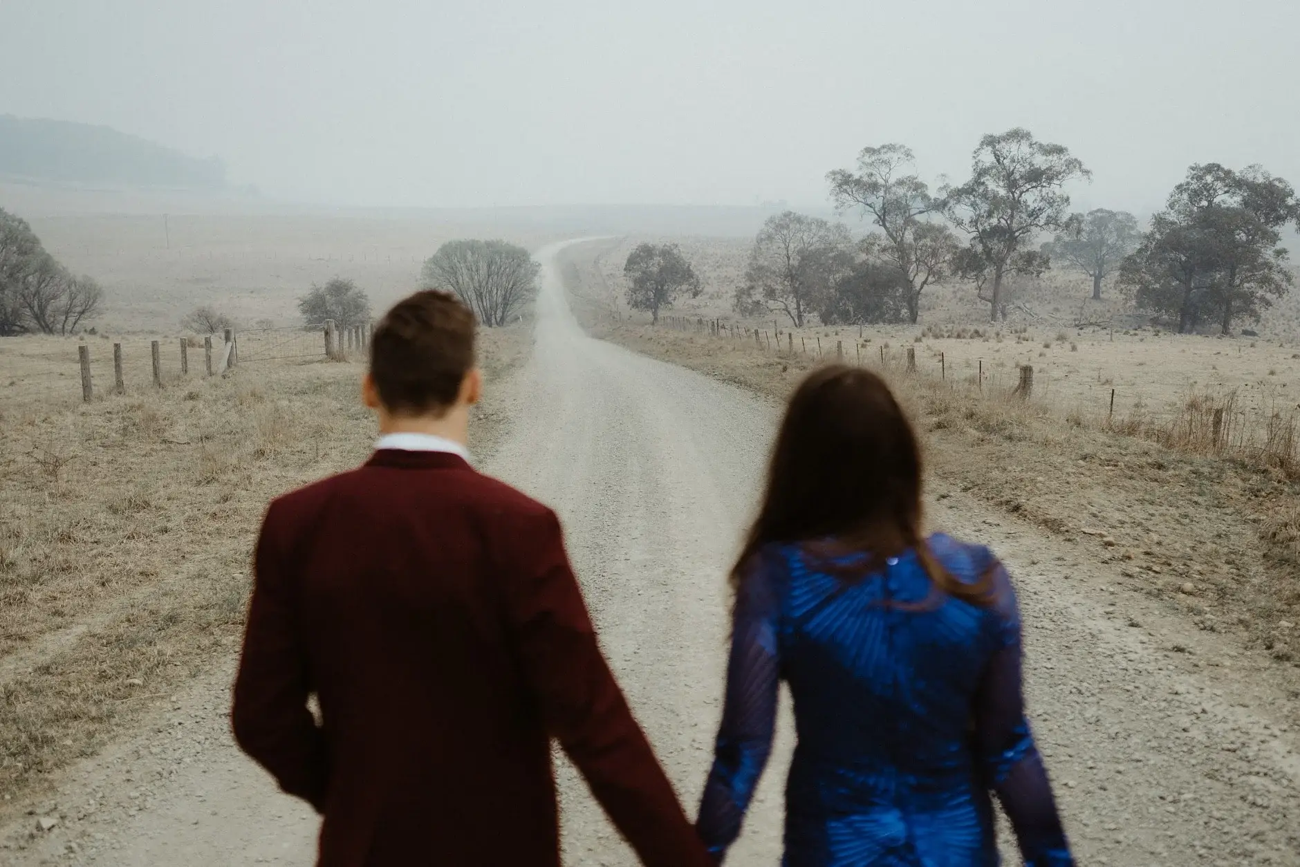 Jess and Drew on the road in the smoke haze, New England National Park