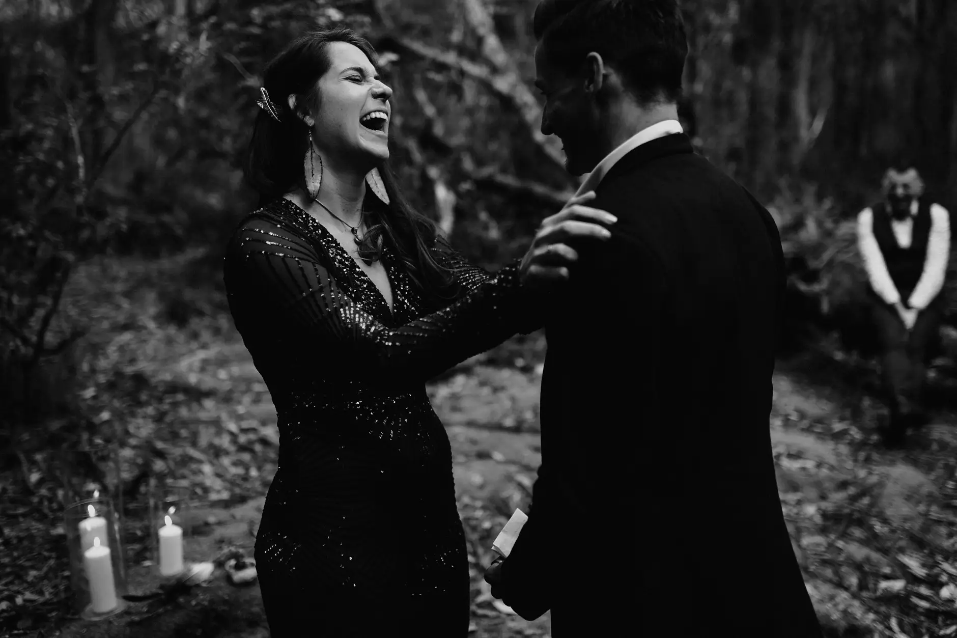 Jess laughing as Drew holds her, black and white, New England