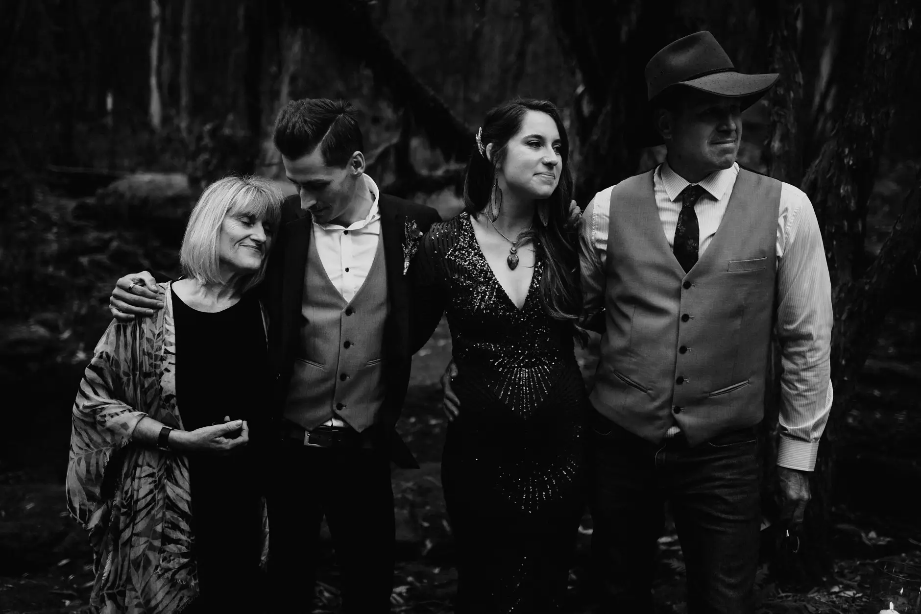 Guests standing together at the ceremony, black and white, New England