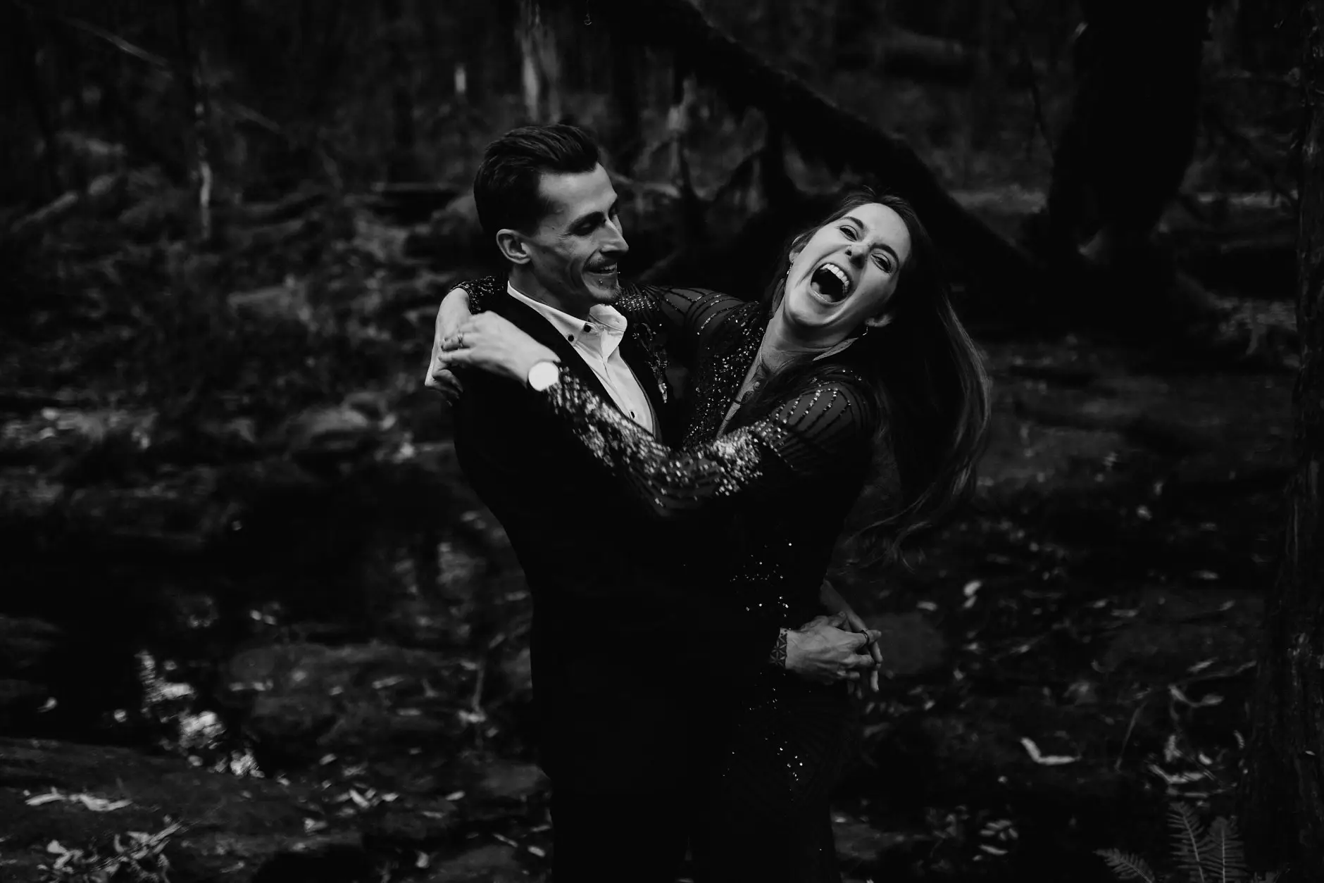 Jess laughing in Drew’s arms, black and white, New England