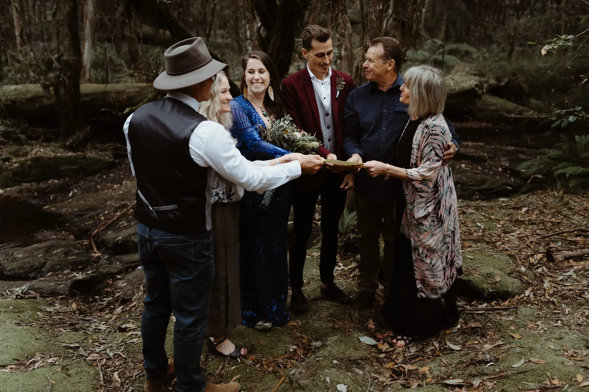 Everyone joining hands in a circle after the ceremony, New England