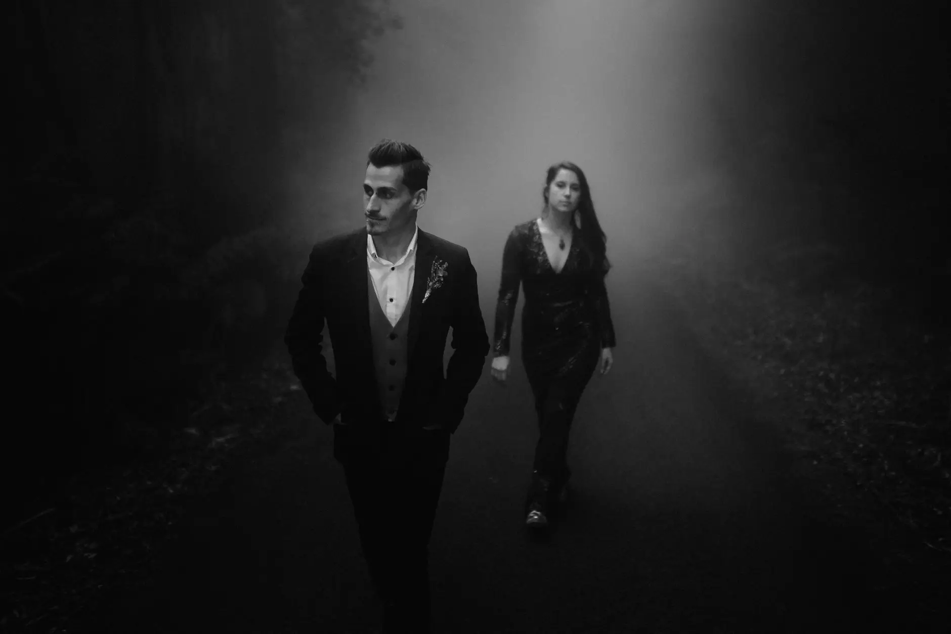 Walking towards the camera in the mist, black and white, New England