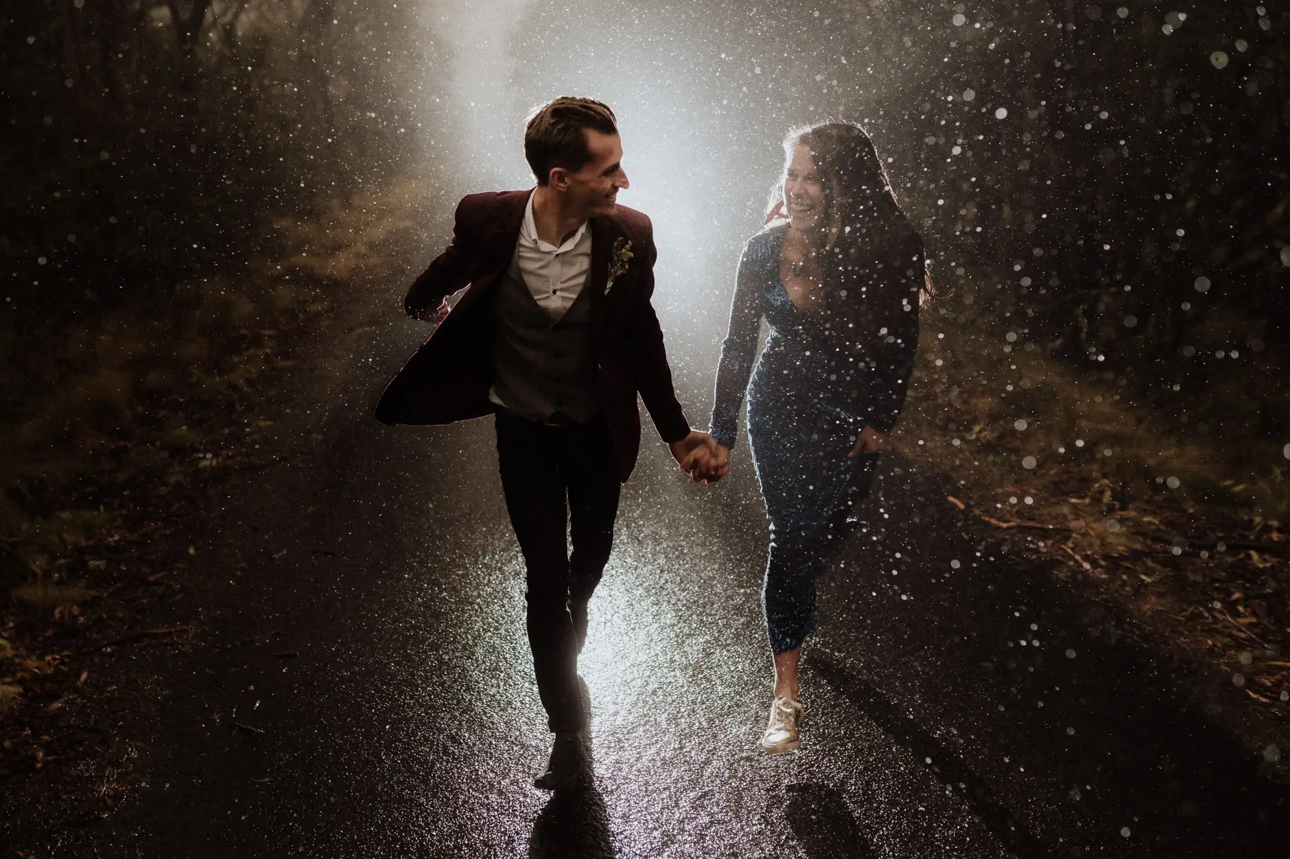 Running hand in hand through the rain, New England National Park