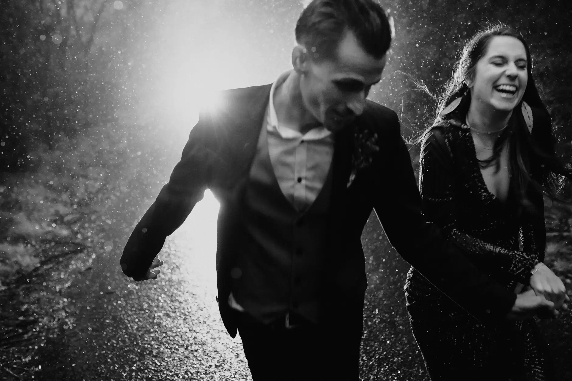 Laughing together in the rain, black and white, New England