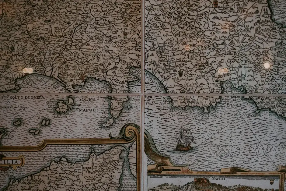 An antique engraved map of the Amalfi coastline, two frames