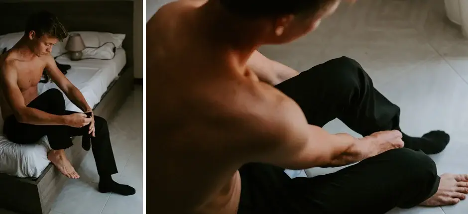 Henrik sitting on the bed pulling on his socks, two frames