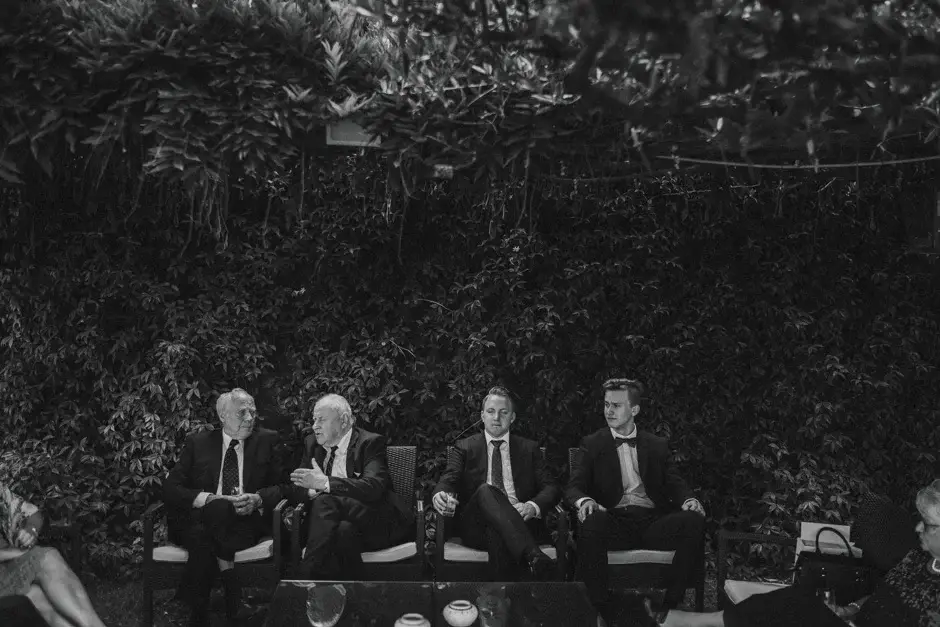 Four men seated in the garden, black and white, Ravello