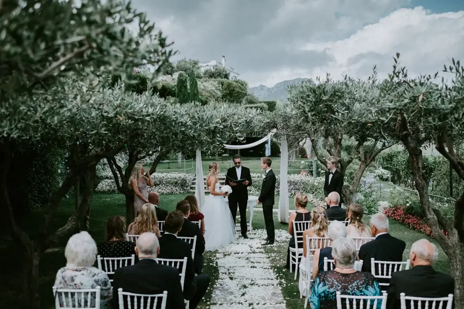 The ceremony in the olive garden seen wide, Ravello