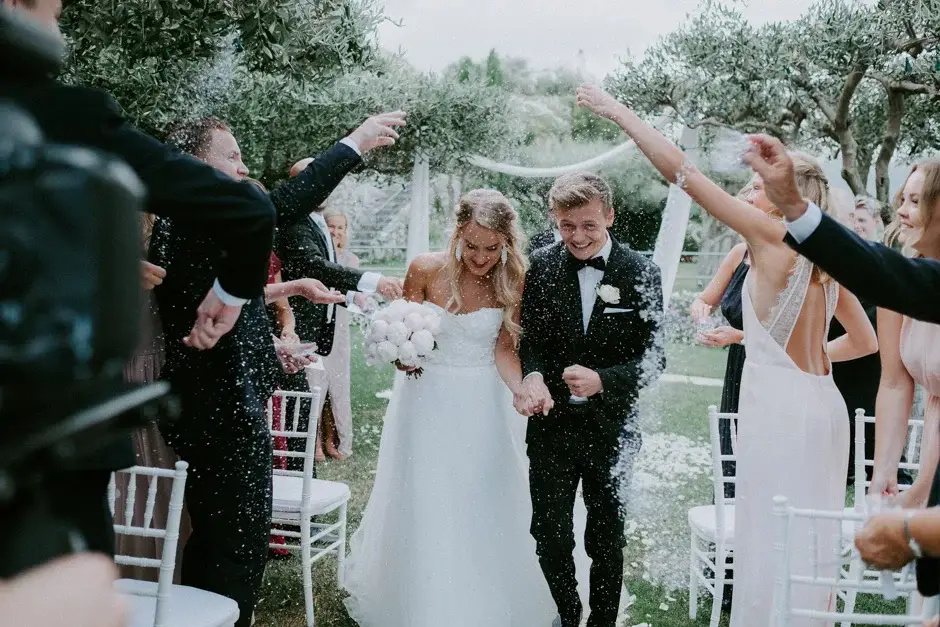 Confetti thrown over Emilie and Henrik after the ceremony