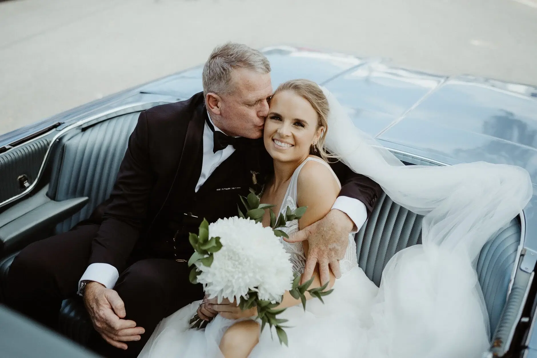 Clair and her father in the car on the way to the ceremony
