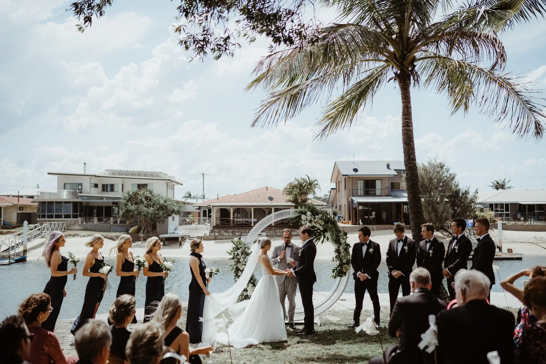 Clair and James at the circular arbour during the ceremony