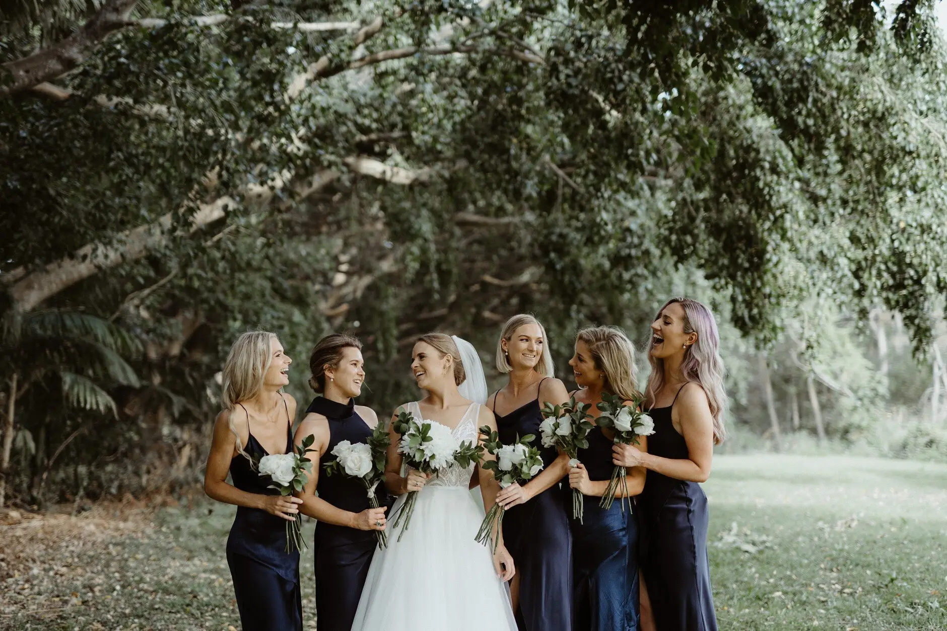 The bridesmaids together among the trees, Burleigh Heads
