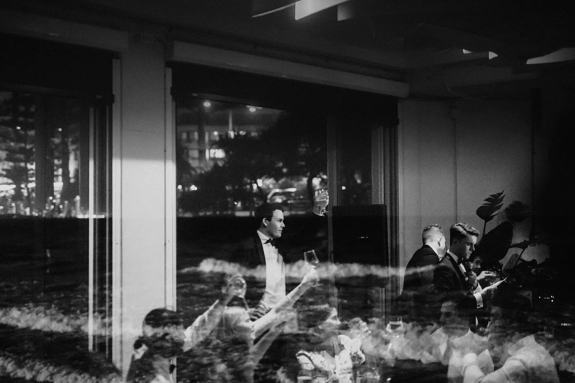 Reflections in the restaurant windows during the speeches