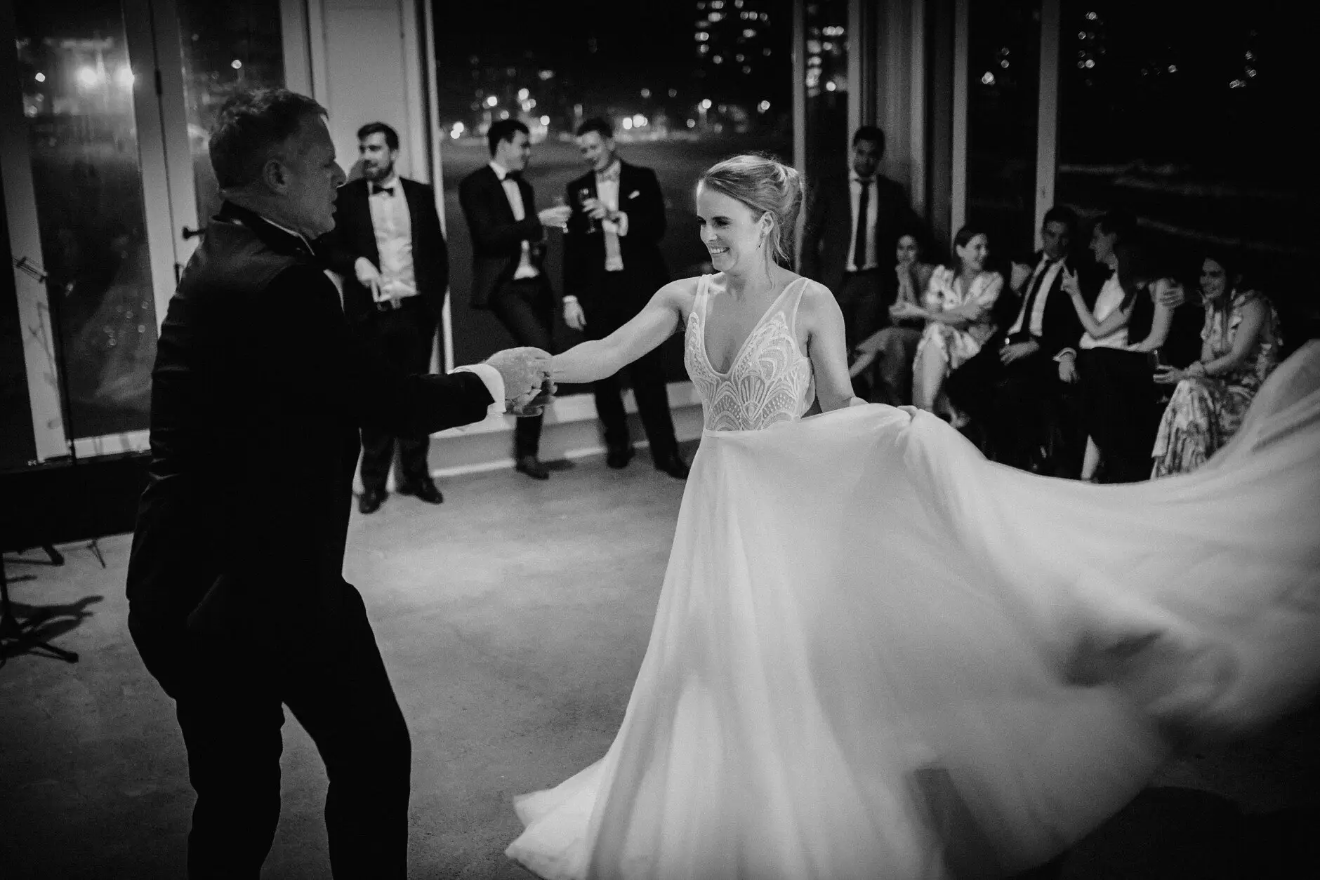 Clair and James dancing with guests around them, Rick Shores