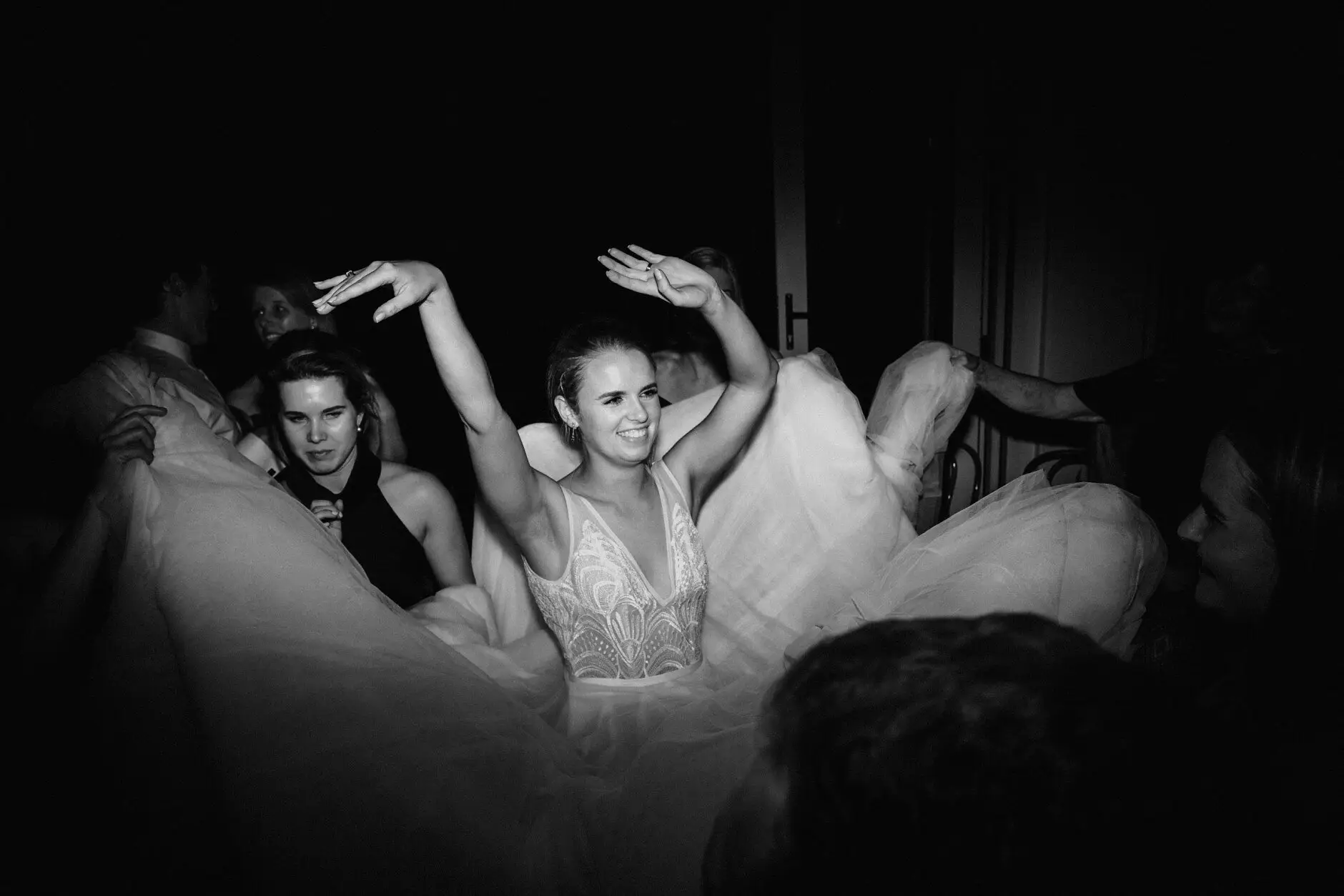 Clair dancing with her arms above her head, Rick Shores