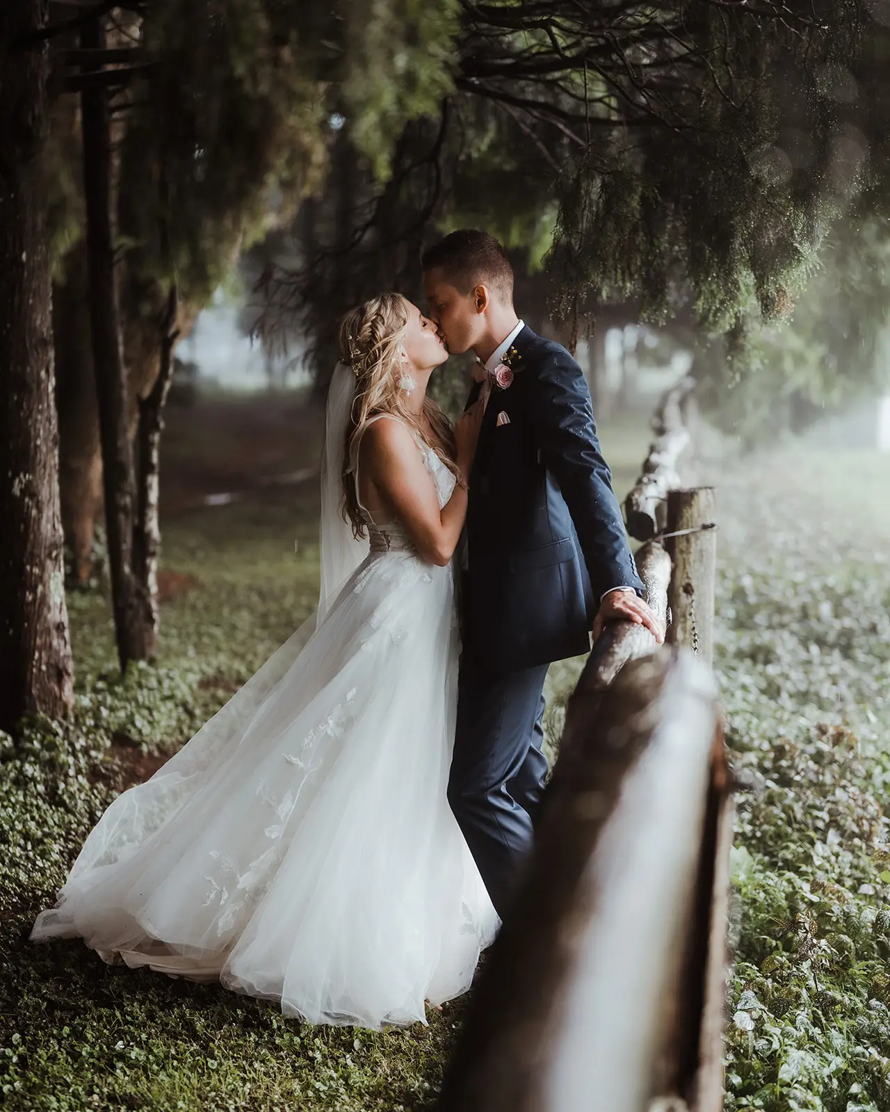 The couple at the timber fence among the pines, Rosewood Estate