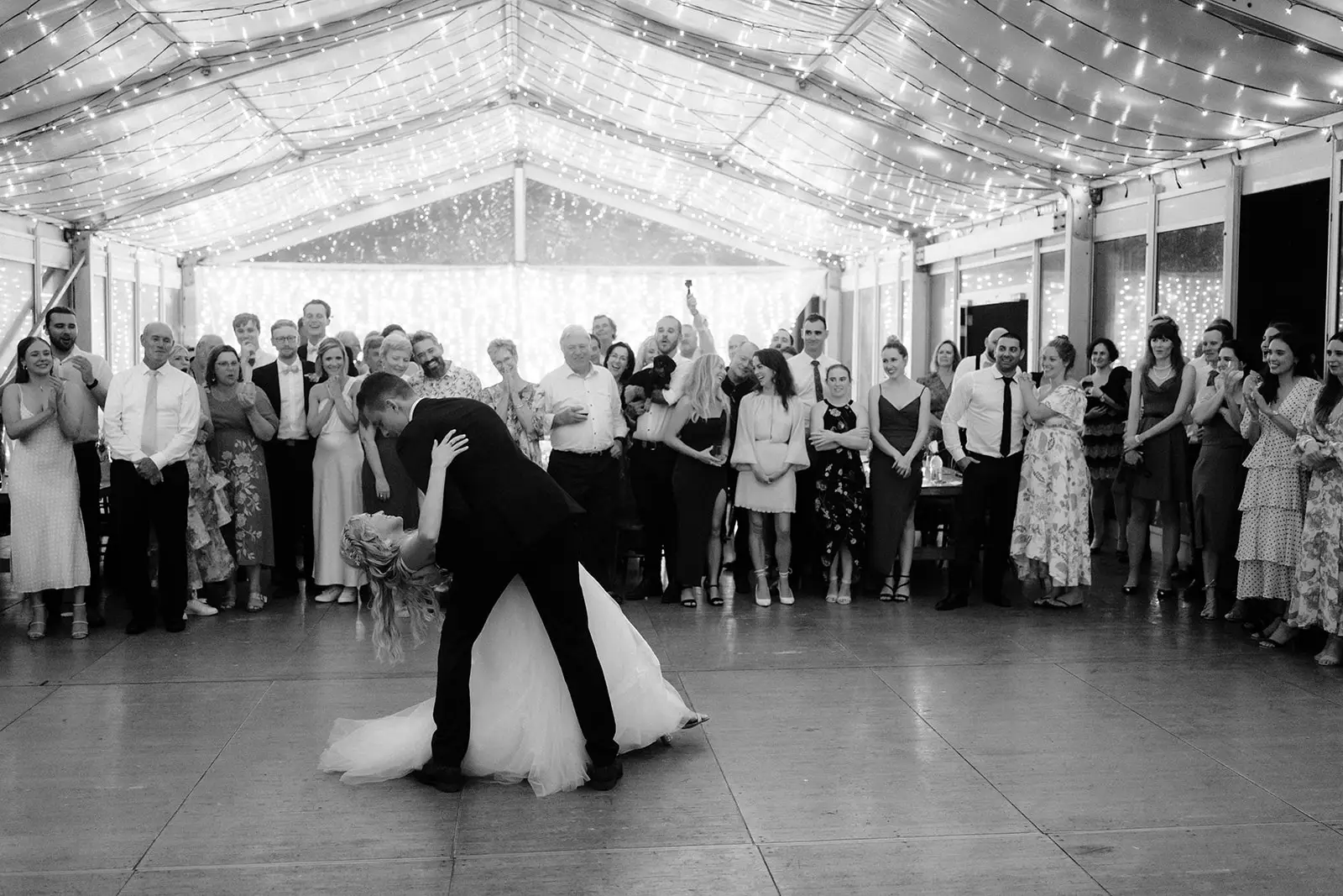 The first dance inside the clear marquee with the guests circled round, Rosewood Estate
