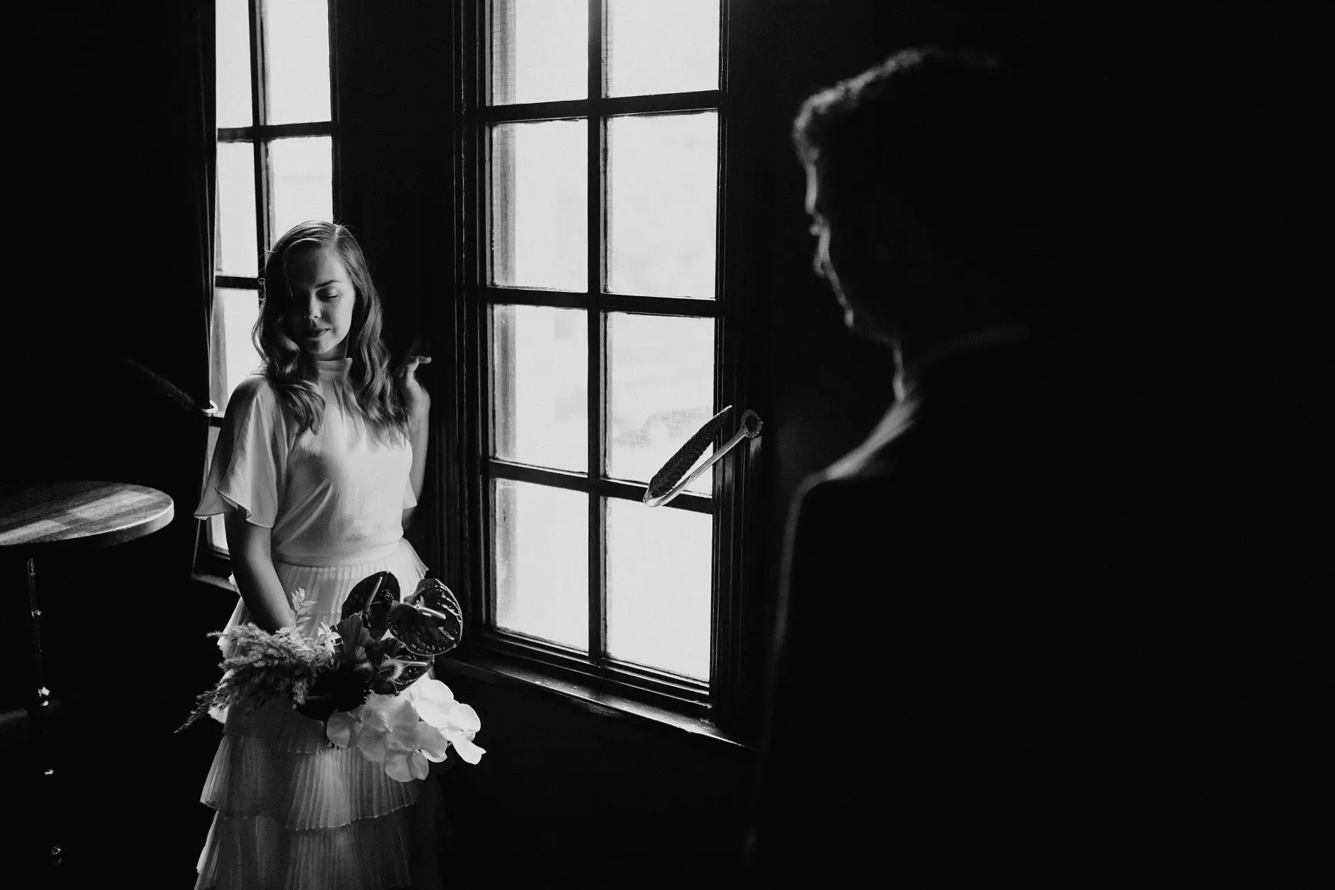 Sophie at the window with her bouquet, Jonathan in silhouette, Casa, Surry Hills