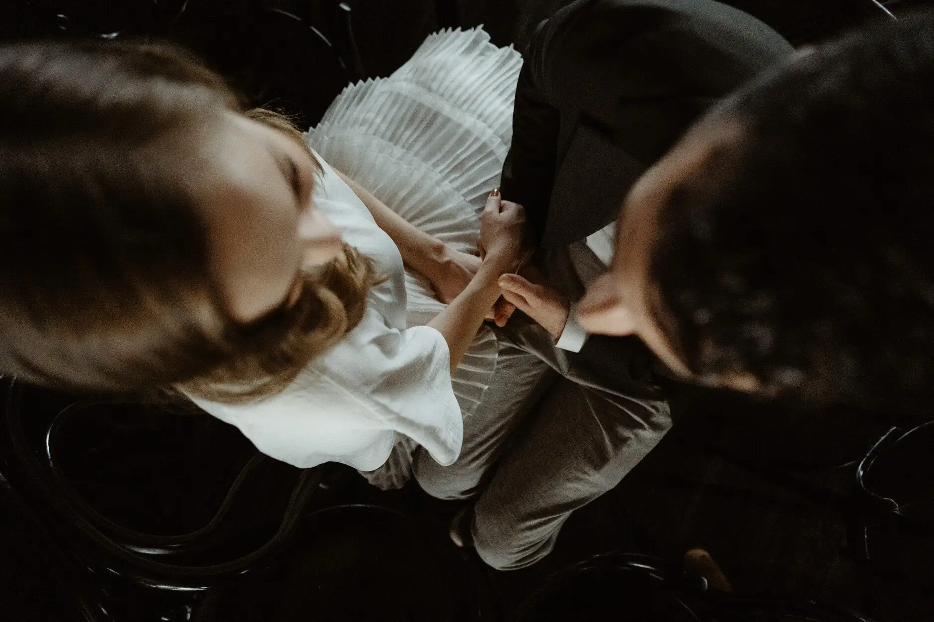 Sophie and Jonathan with their heads together in the warm light, Casa, Surry Hills