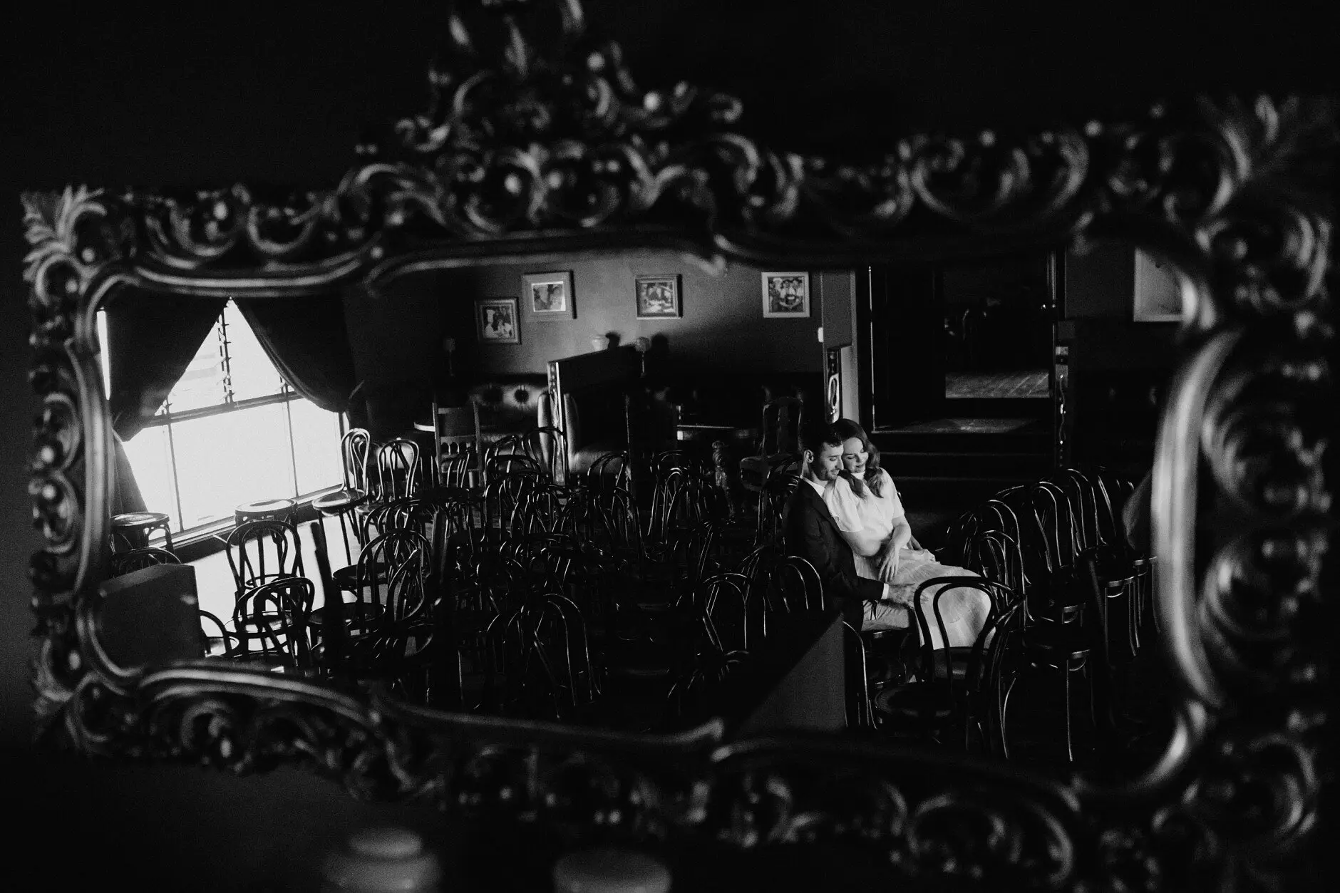 The room and the two of them reflected in an ornate mirror, Casa, Surry Hills