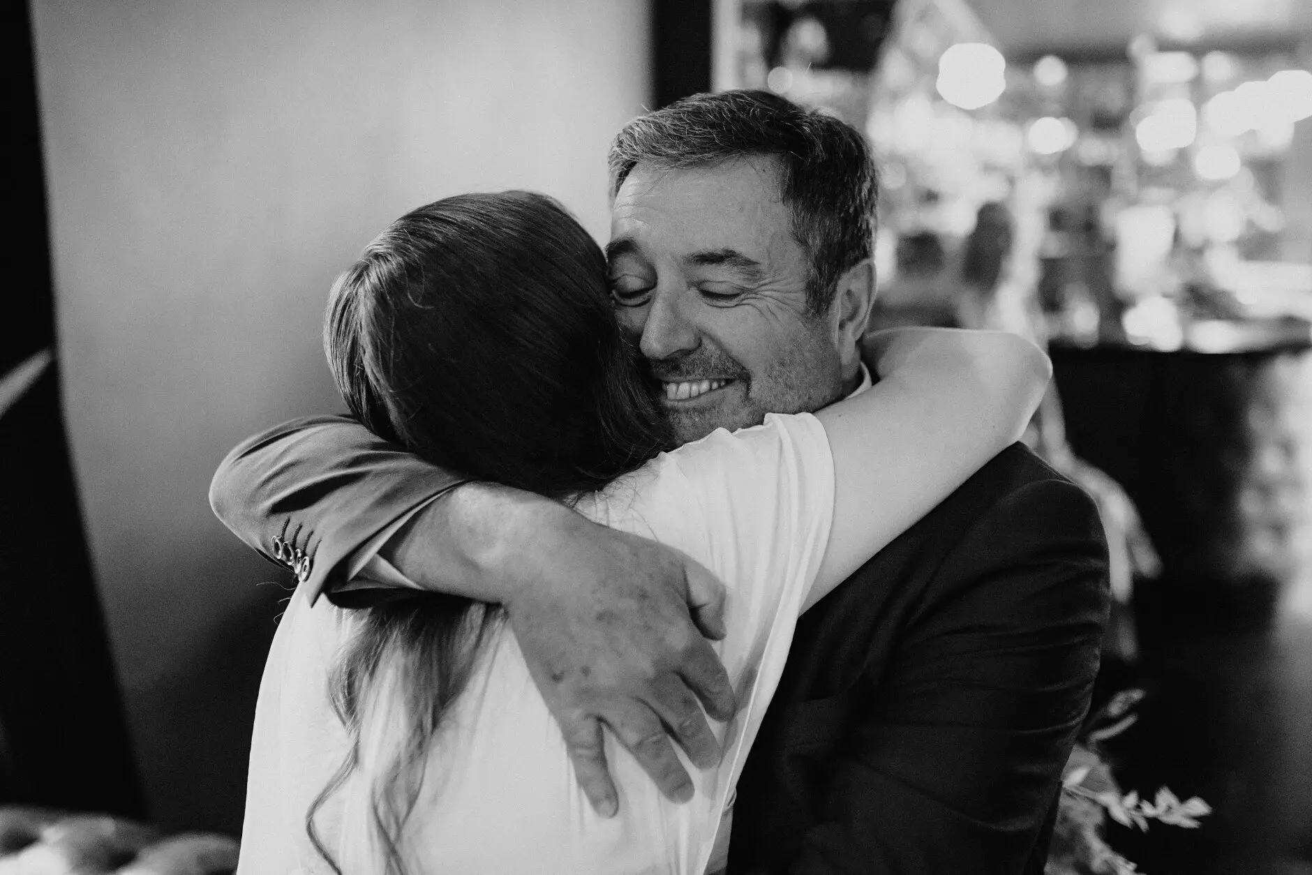 Sophie hugging her father, both of them beaming, Porteño, Surry Hills