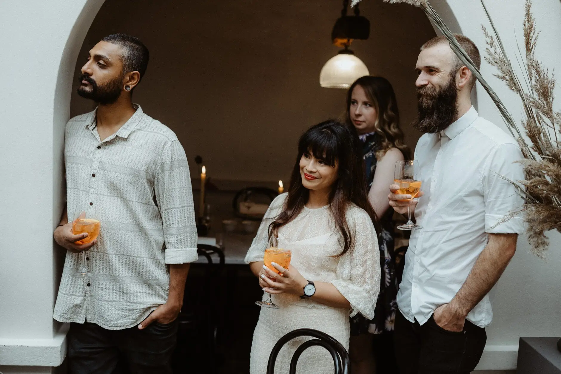Guests with spritzes beside the dried arrangement, Porteño, Surry Hills