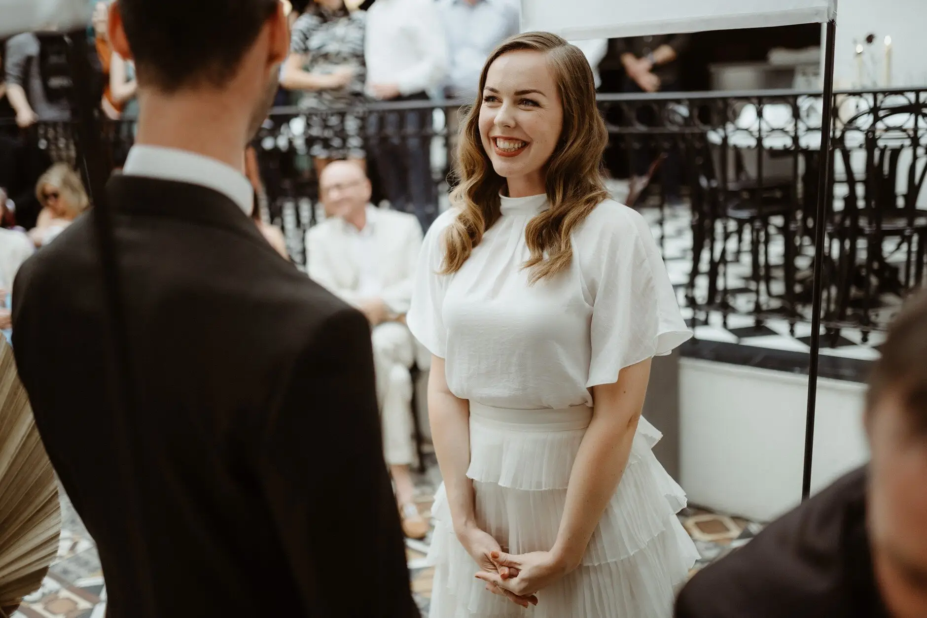 Sophie and Jonathan facing each other during their vows, Porteño, Surry Hills