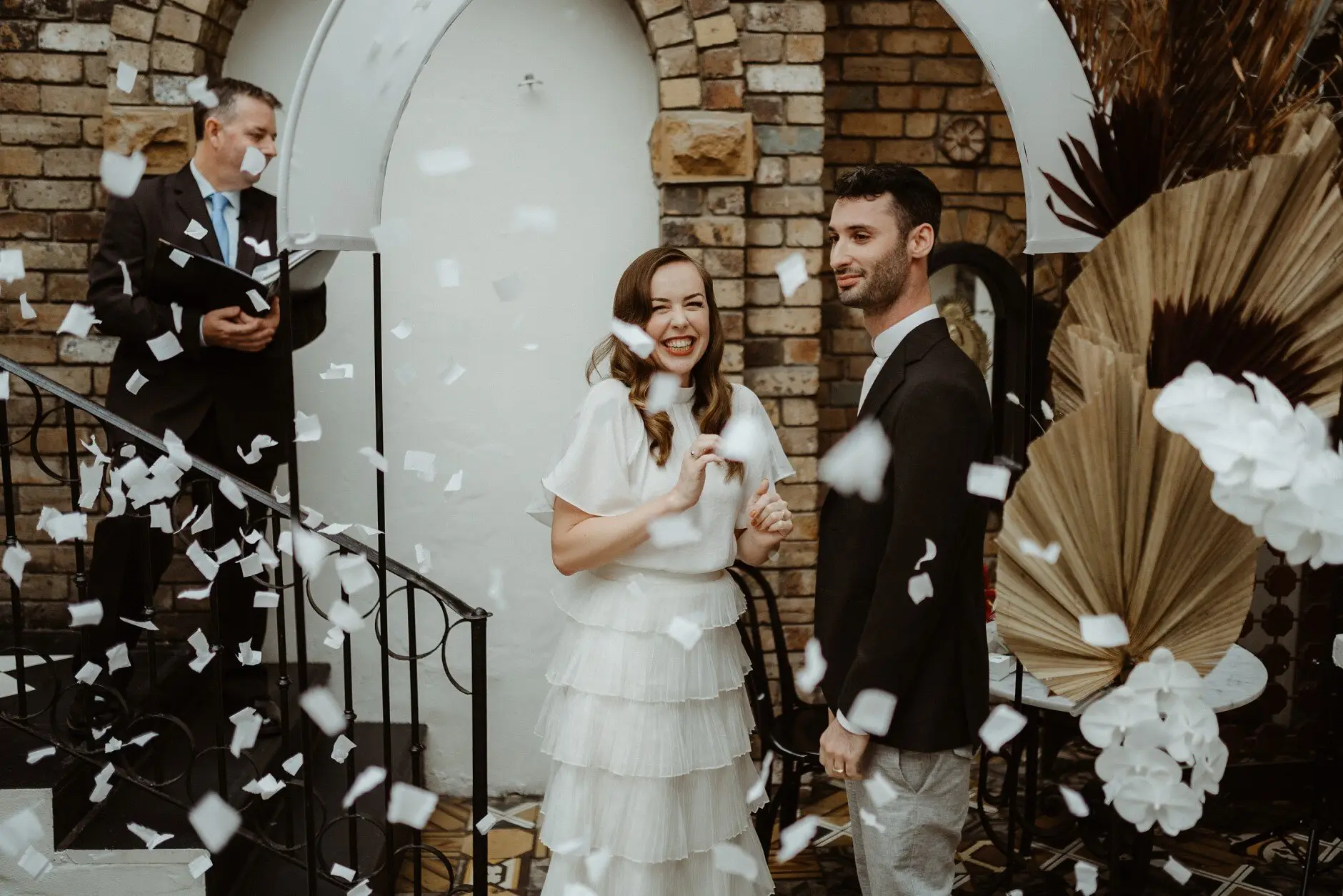 Confetti over the newlyweds on the stairs, Porteño, Surry Hills