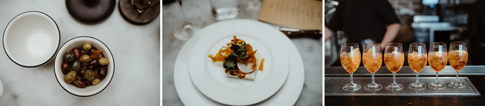 Olives, a plated course, and a tray of spritzes, Porteño, Surry Hills