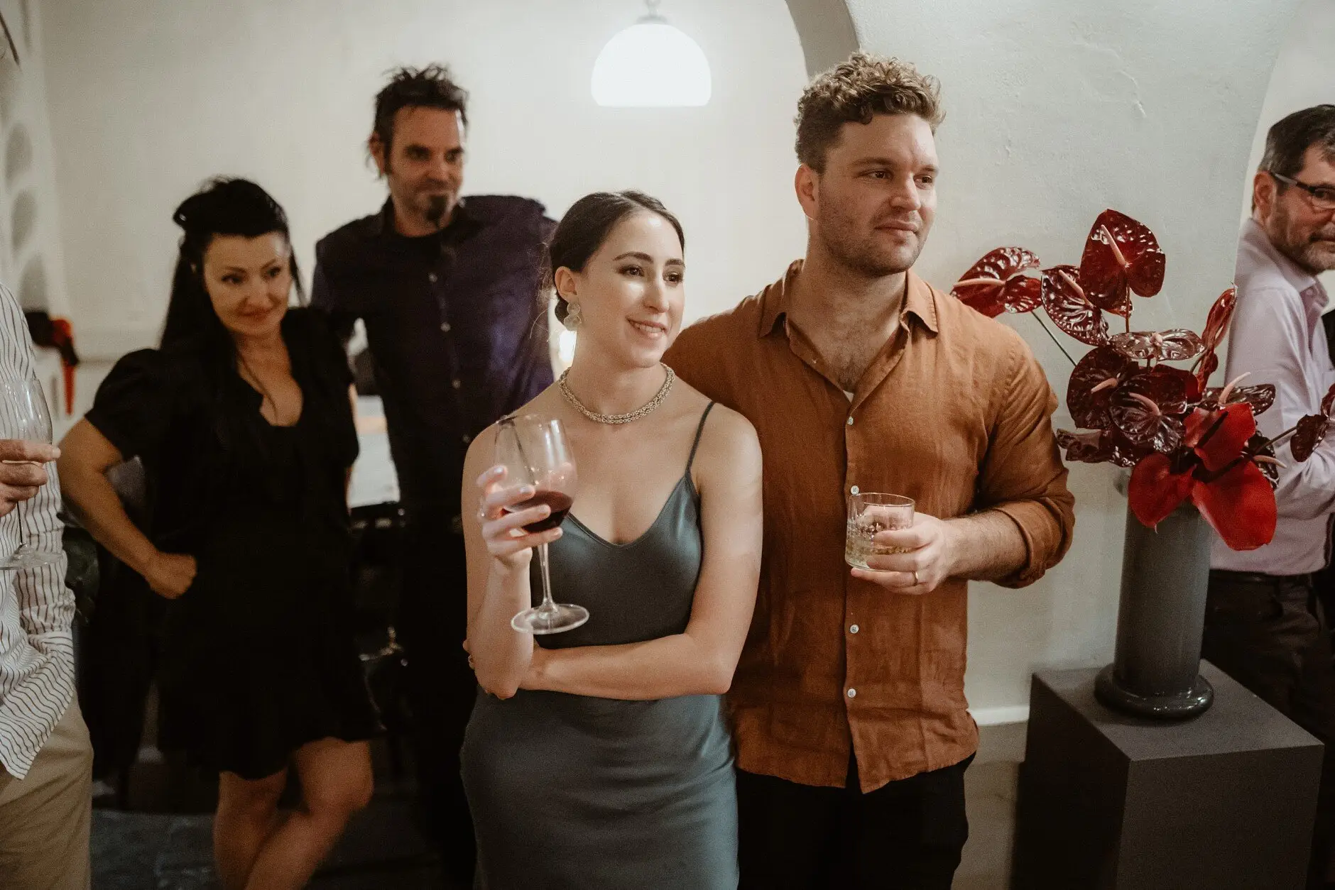 Guests posing with their drinks and a red balloon, Porteño, Surry Hills