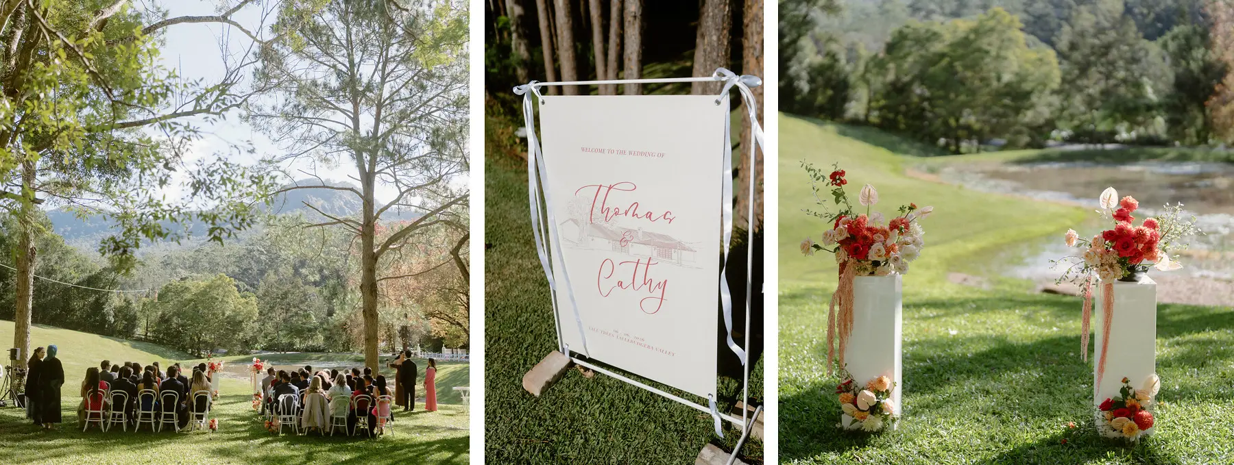 Guests seated on the lawn, the hand-lettered welcome sign, and the floral plinths at the top of the aisle, Tall Trees Tallebudgera Valley