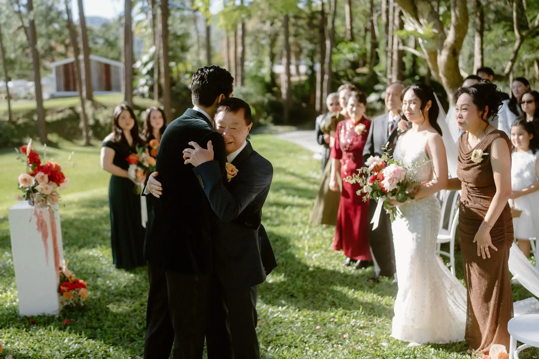 A hug at the top of the aisle, and Cathy with her bridesmaids before the vows, Tall Trees Tallebudgera Valley